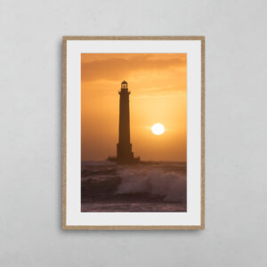 Coucher de soleil derrière le phare de Goury